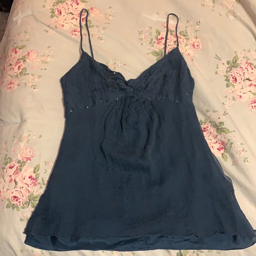 This is a tank top I’ve had since the early 2000’s, and it’s in prime condition!